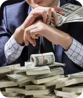 man calculating his finances using calculator